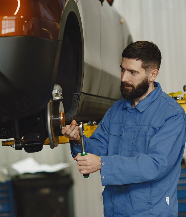 Auto mechanic with wrench